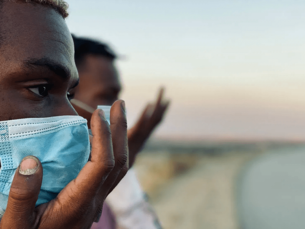 Close up of a dancer in mask from Alán Pérez dance film